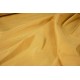 Tessuto unito di colore giallo che mima l'effetto della seta