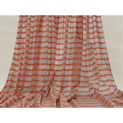 Tessuto a metraggio in mussola di cotone color arancione e grigio