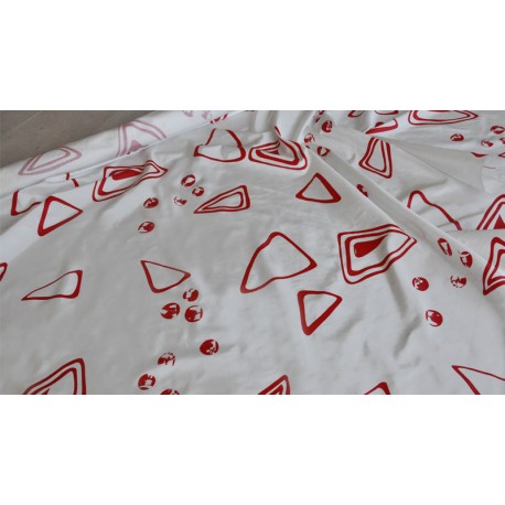  	Tessuto in taffetas bianco stampato con motivo geometrico rosso